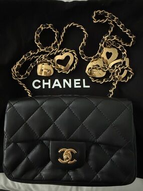 CHANEL Black Quilted Lambskin Shoulder Bag with Gold Chain and Heart Charms